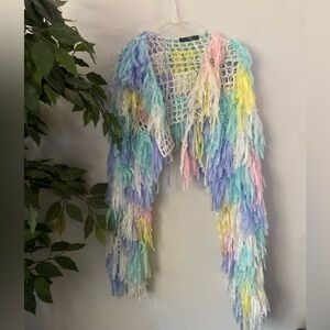 Colorful netted fringe sweater .